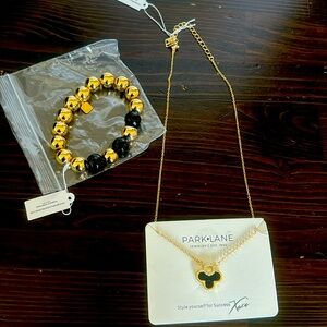 Gold and black Bracelet and necklace set.